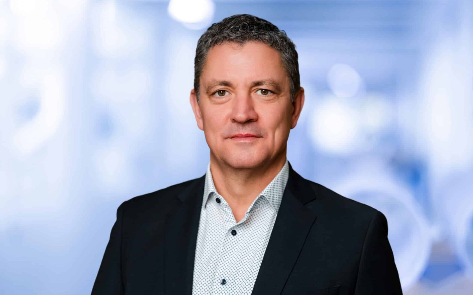 Chris Förster, Geschäftsführender Direktor QSIL SE